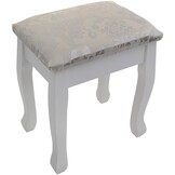 Een cosmetische kaptafel met een spiegel en een krukje