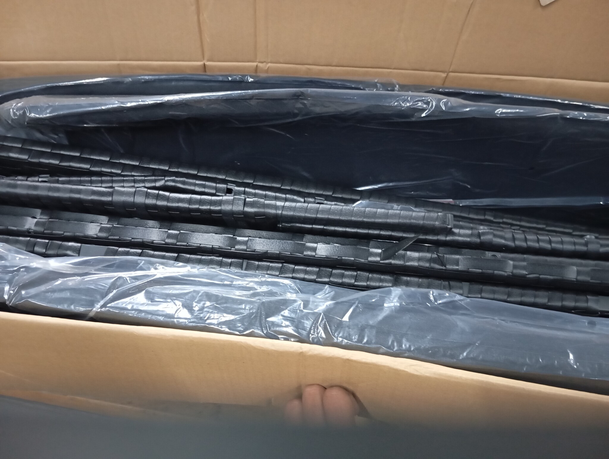 vidaXL Tuinbank L-vormig met kussens poly rattan zwart