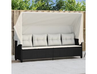 vidaXL Ligbed met luifel en kussens poly rattan zwart