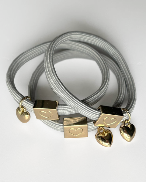 10 HELLGRAUE ARMBANDER, HAARELASTIC