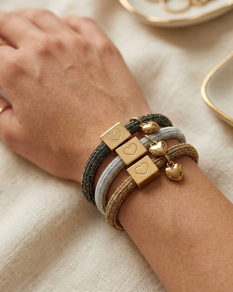 10 BRACELETS ELASTIQUES POUR CHEVEUX SPARKLE OR NOIR