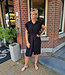 Doorknoop Dress met Ruffle Zwart