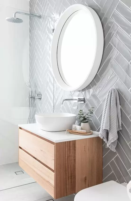 Visgraat tegels in de badkamer Visgraat tegels in de badkamer