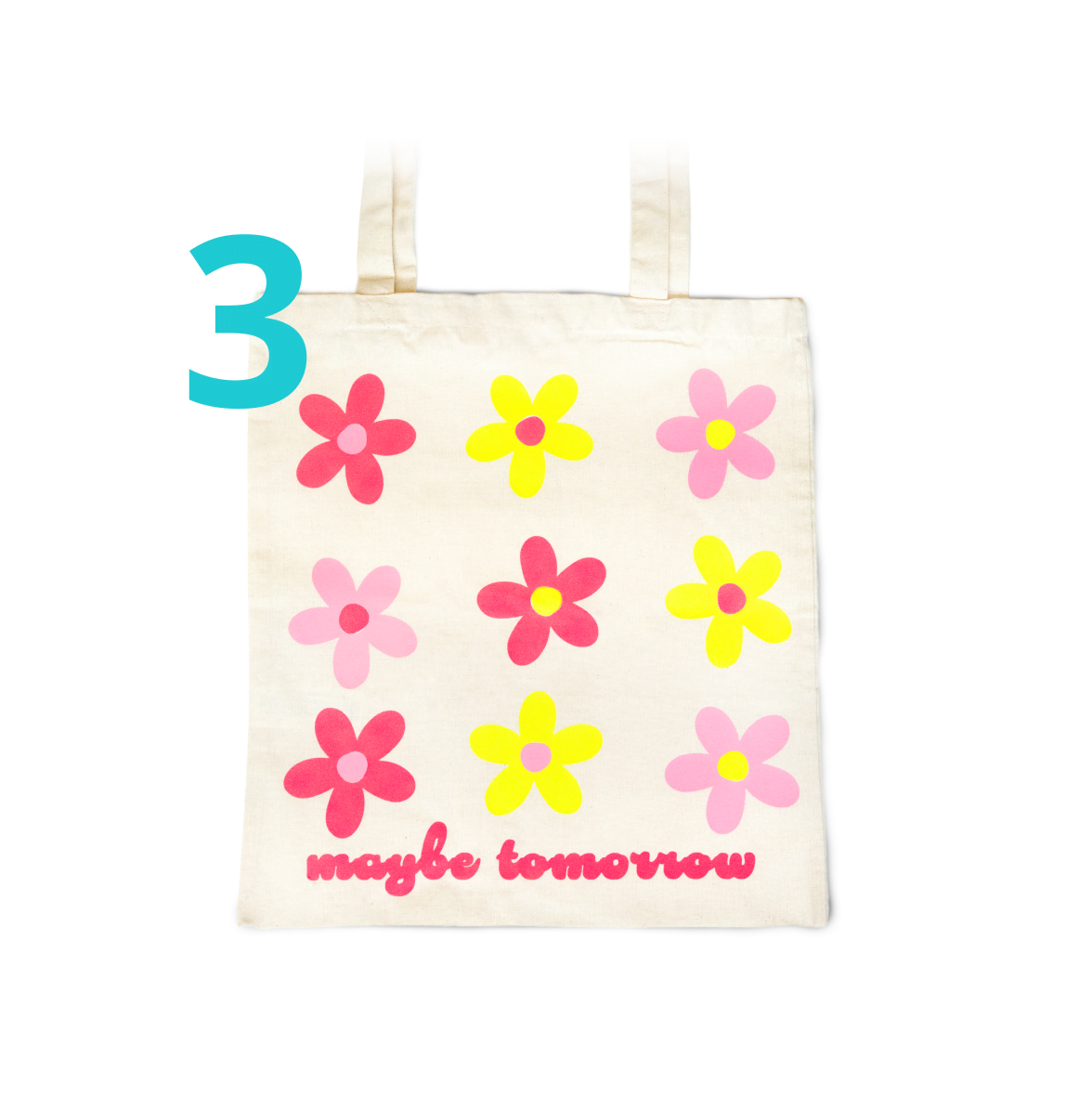 Top view of a white tote bag with 9 flowers in yellow and pink heat transfer vinyl and the text 'maybe tomorrow' in pink.