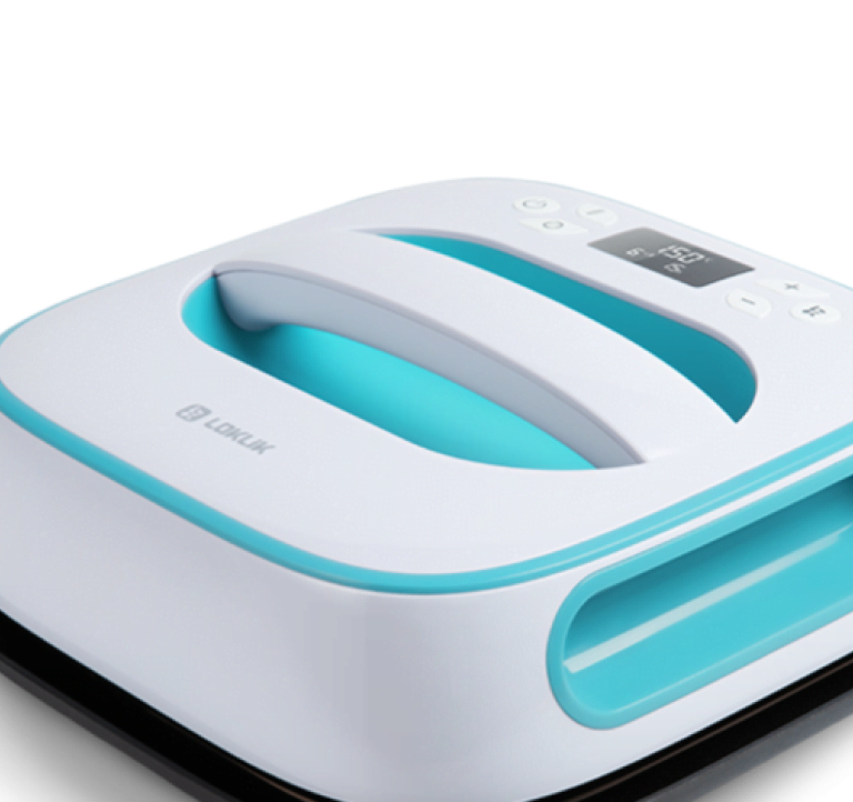 Close view of the screen of a LOKLiK Easy Heat Press in Romance Pink. The screen is off.