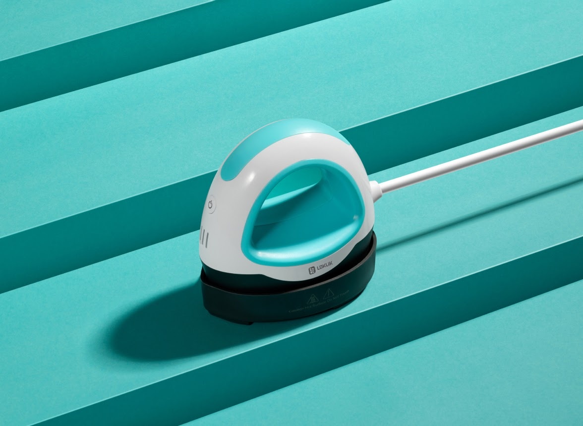 Mini Heat Press in LOKLiK Blue on a striped aqua background.