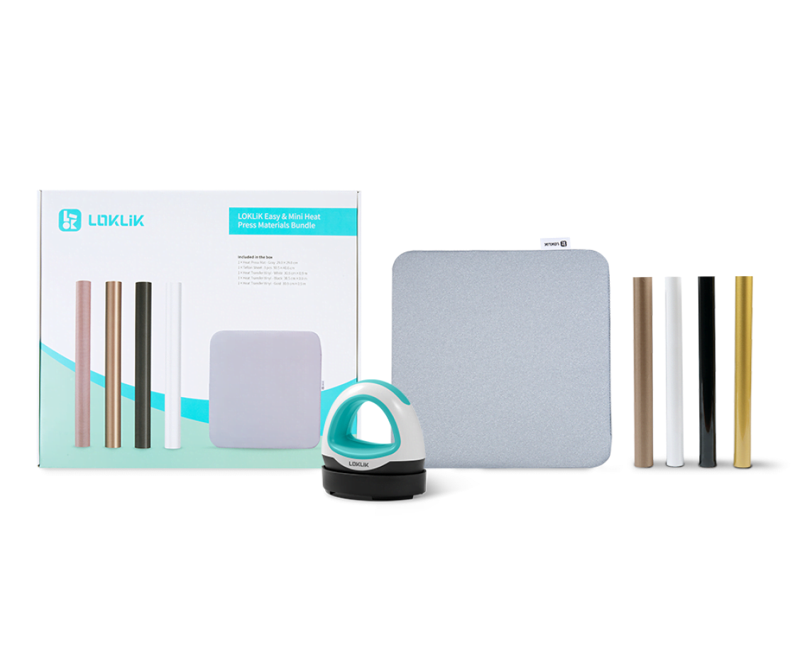View of a LOKLiK Mini Heat Press in LOKLiK Blue in front of an Mini Heat Press Starter Pack and its contents: a heat press mat, a roll of teflon sheets and heat transfer vinyl in white, black and gold.