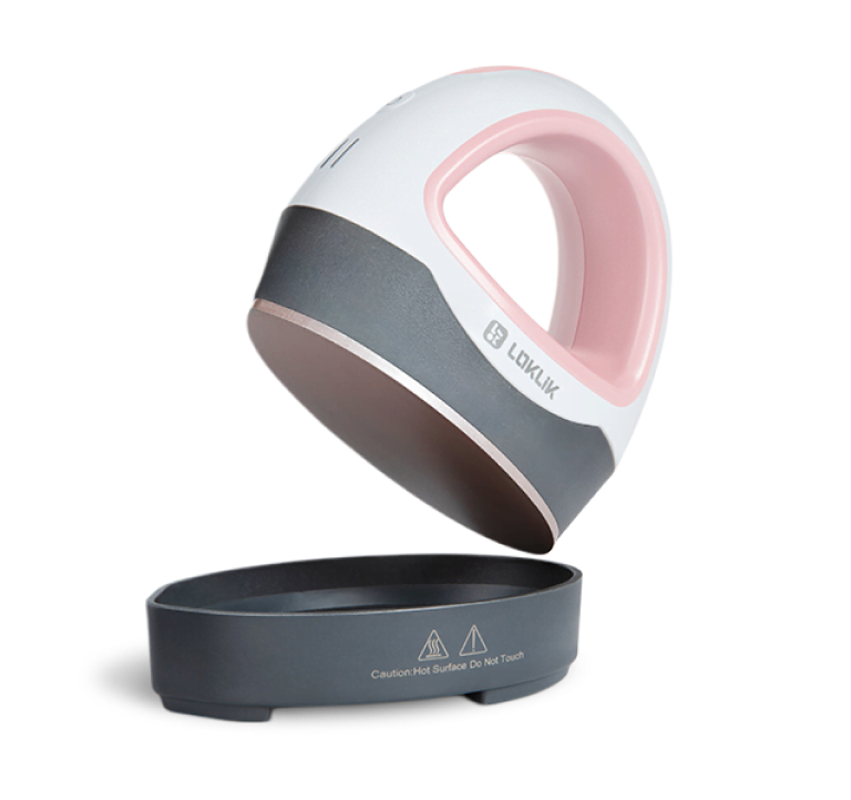 LOKLiK Mini Heat Press in Romance pink floating at an angle from its safety base. You can see the ceramic-coated heating plate.