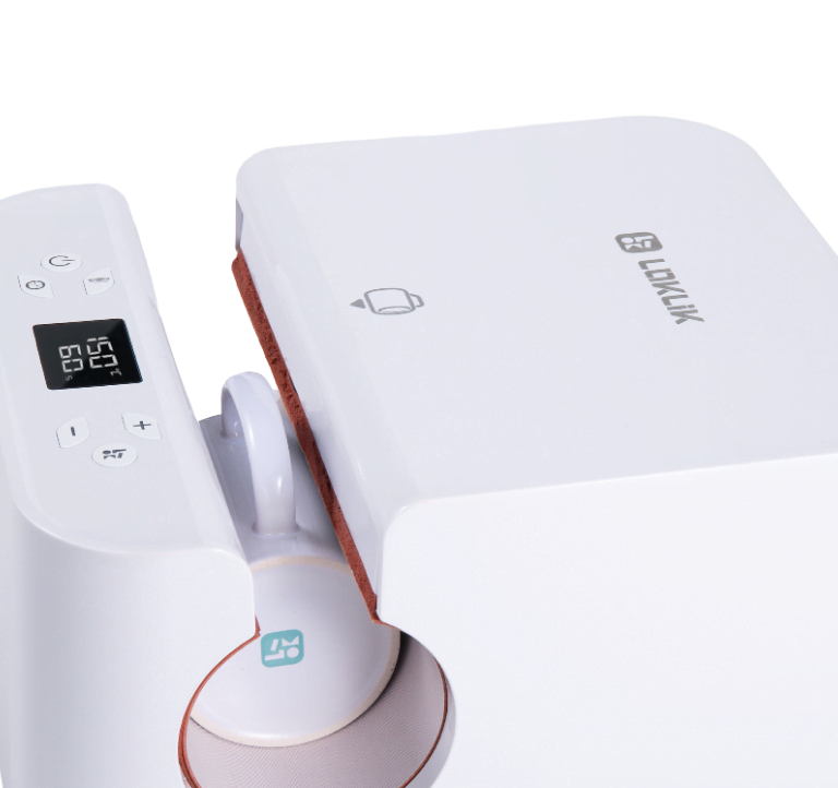 LOKLiK Auto Tumbler Heat Press at an angle with a sublimation mug placed inside.