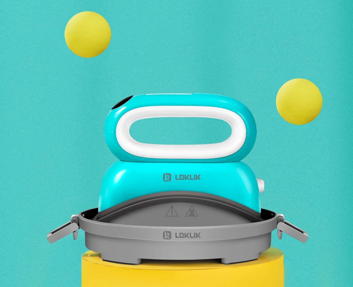 LOKLiK Impress™ Hat on its safety base standing on a yellow base against a teal background. Two yellow balls are floating in the air.