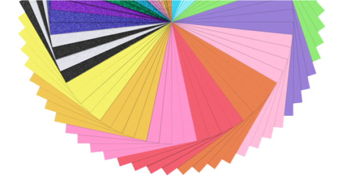 Cardstock in a rainbow of colours spread out in a circular fan.