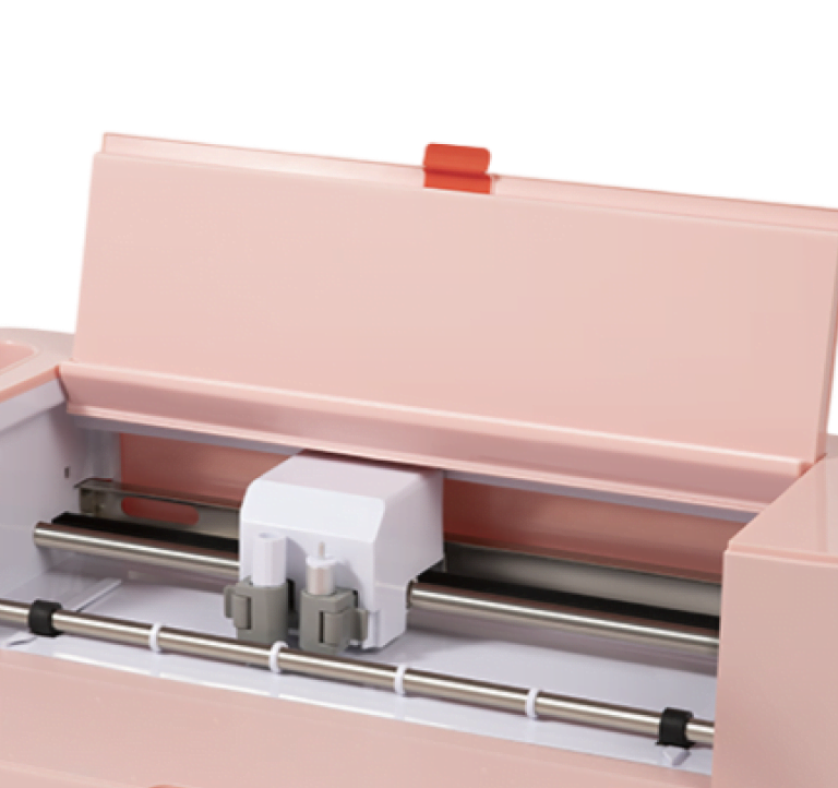 LOKLiK Crafter in Romance pink at an angle. The Crafter is open and the inside carriage is visible.