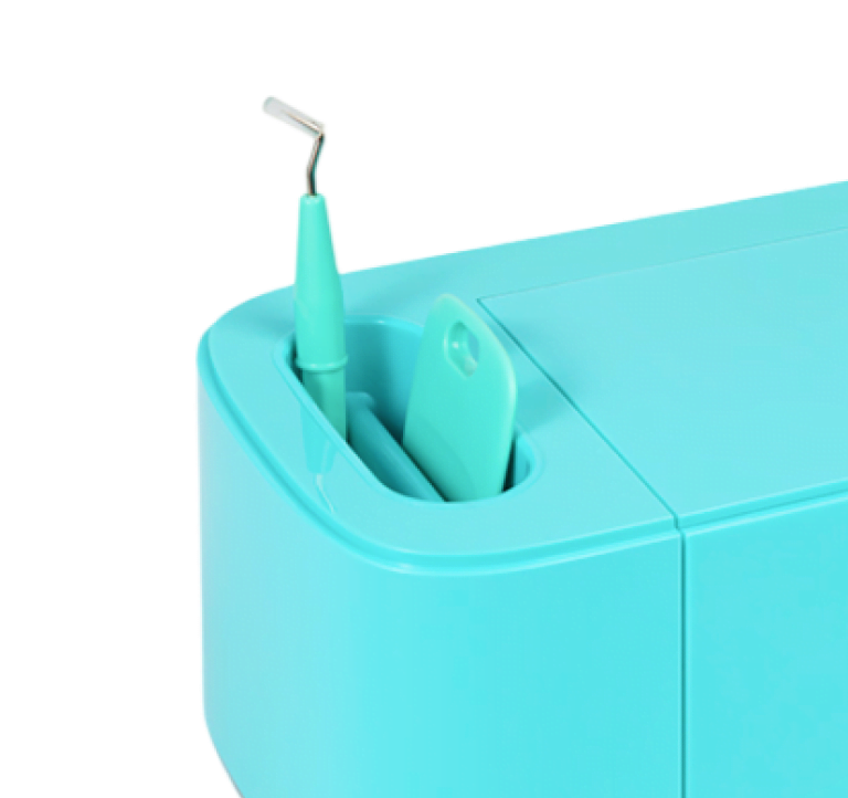 Close view of the tool holder of a LOKLiK Crafter in LOKLiK Blue. The compartment has a weeding tool and scraper inside.