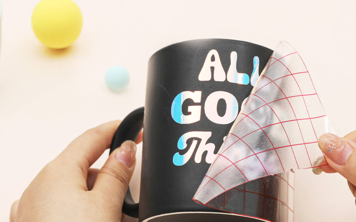 Auto Heat Press in LOKLiK blue at an angle with the large ironing board pulled out showing the heat press mat.