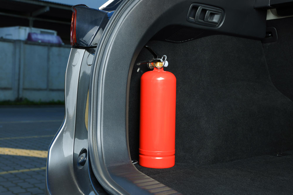 Waar brandblusser in auto plaatsen?