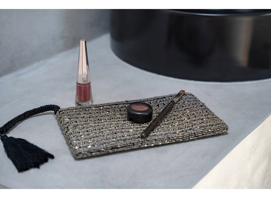 De Zilveren Clutch
