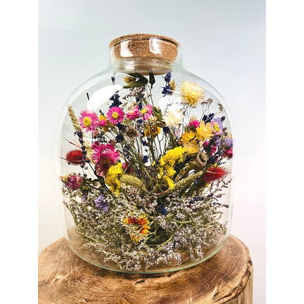 Torkade blommor i glas