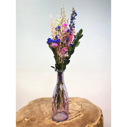 Flaskor med torkade blommor