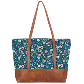 Håndtaske med glade blomster – kork & læder