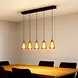 Highlight Hängeleuchte Tromba 5-Licht L 108 cm bernstein-schwarz Highlight Hängeleuchte Tromba 5-Licht L 108 cm bernstein-schwarz