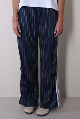 Haute L'Amitie Marineblaue Baggy-Nadelstreifenhose