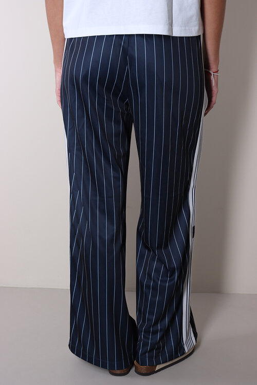 Haute L'Amitie Marineblaue Baggy-Nadelstreifenhose