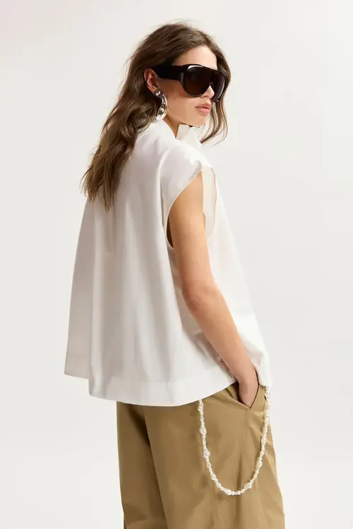 Essentiel Antwerp Off White Ärmelloses Top mit Schleifenkragen