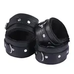 Juego de Bondage BDSM con esposas y tobilleras.
