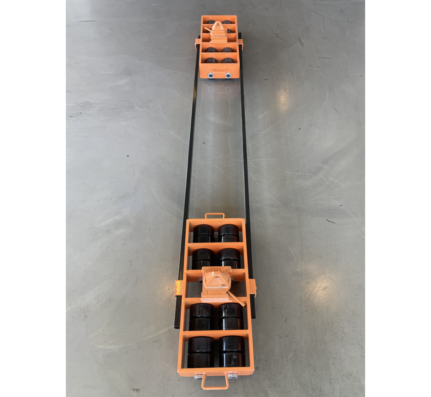 Container moving skate with twist locks and 20 ton load capacity with 4x16 wheels per skate for handling ISO Freight containers