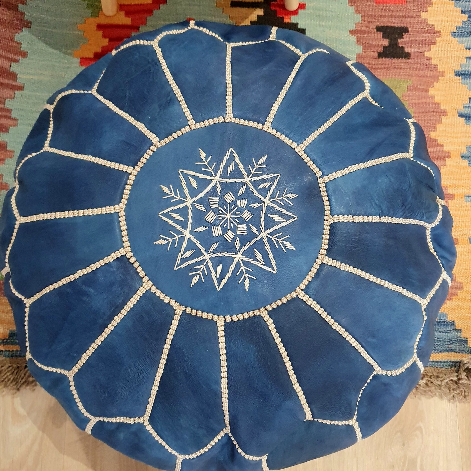 Blue Moroccan pouf in handmade leather