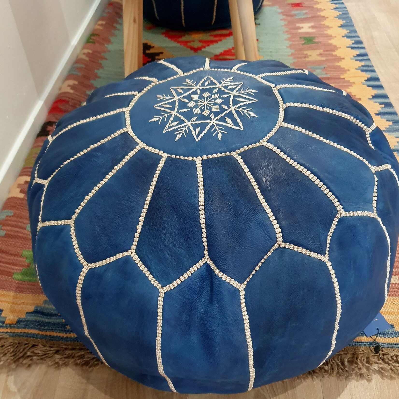 Blue Moroccan pouf in handmade leather