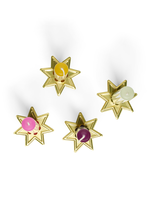 4 goldene, sternförmige Kerzenständer