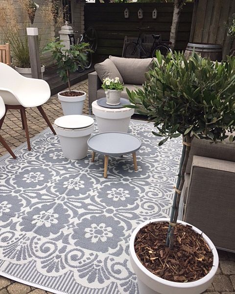 Grauer-weißer Outdoor-Teppich