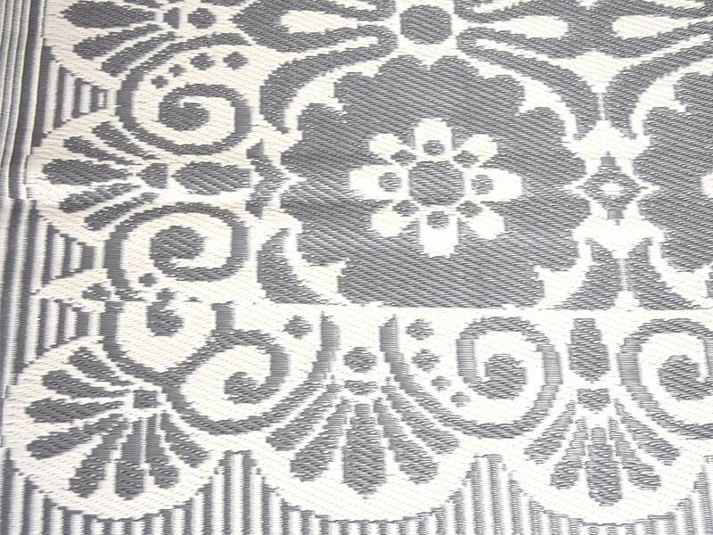 Grauer-weißer Outdoor-Teppich