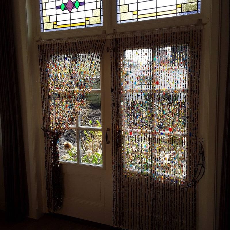 Perlenvorhang aus Glas, bunt.