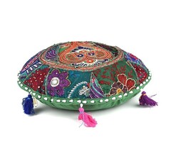 Grünes rundes Kissen