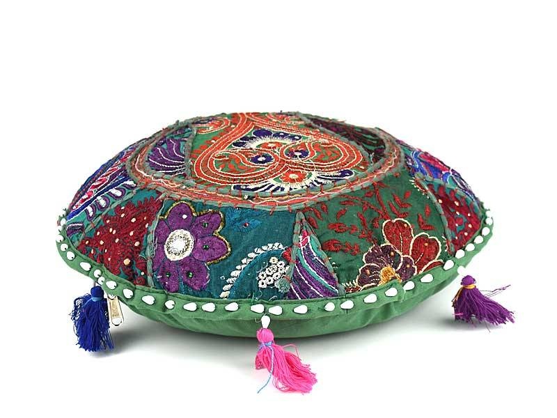 Grünes rundes Kissen