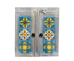 Blaues Badezimmerschränkchen mit orientalischen Fliesen