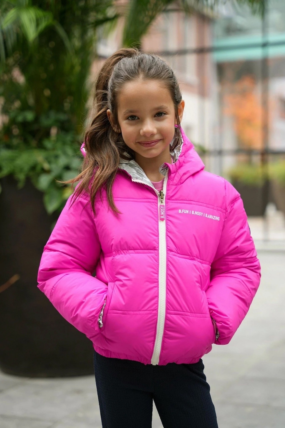 Hot pink reversible winterjas voor meiden