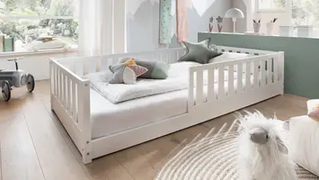 Zelfstandig slapen, spelen en ontdekken in een Montessori vloerbed 