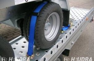 Wielspanband voor autotransporter