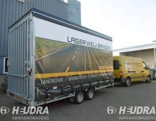 Gesloten aanhangwagen met huifopbouw op maat