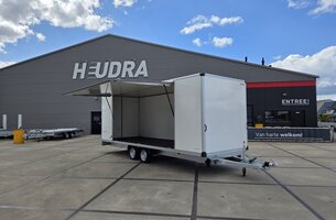 Humbaur gesloten plateauwagen 3500kg 618x203x209cm met verkoopklep