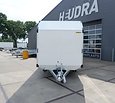 Humbaur gesloten plateauwagen 3500kg 518x203x209cm met zijdeur en schuin dak