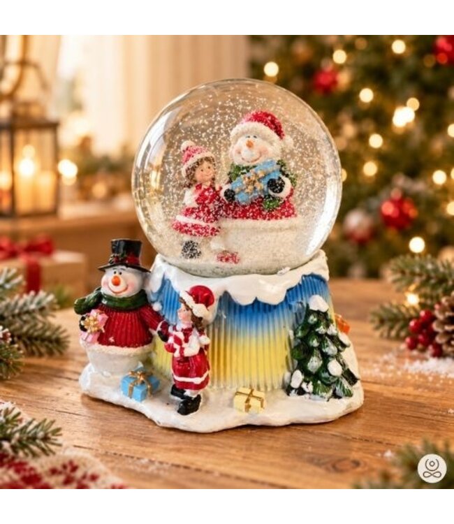 Kerst sneeuwbol met muziekdoosje – Sneeuwpop en meisje – 16 cm