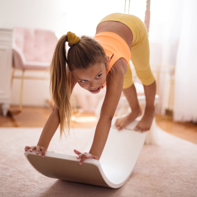 Wooden balance board with felt in white for play and motor skills