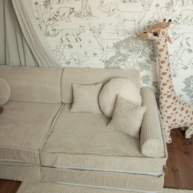 Modulaire roze corduroy kinderbank met zachte kussens en flexibel ontwerp
