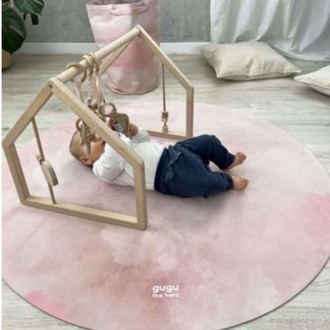 Round play mat in soft pastel shades with cloud design, durable and comfortable