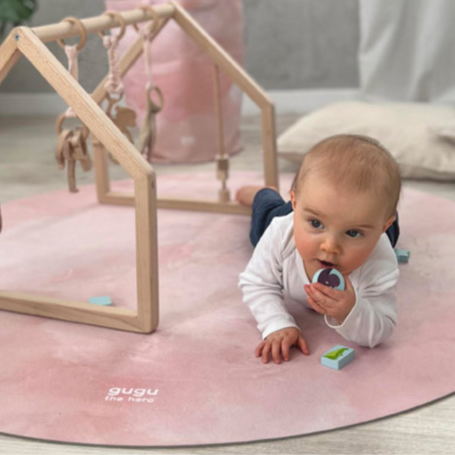 Tapis de jeu rond en tons pastels avec motif nuage, durable et confortable