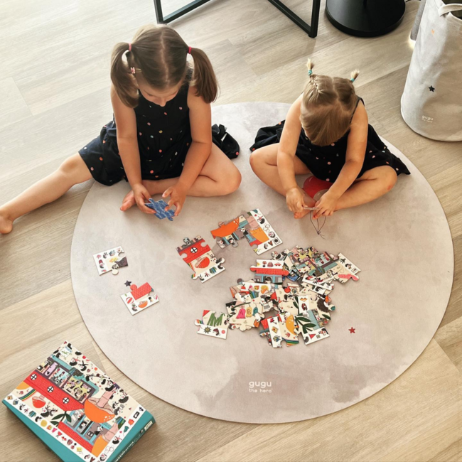 Tapis de jeu rond avec motif montgolfière en tons doux, durable et confortable